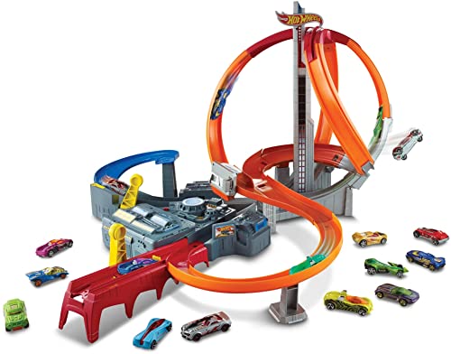 Hot Wheels Pista de coches de juguetes Spin Storm con dos lanzadores y dos loopings (Mattel CDL45)